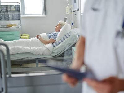 Older woman in hospital bed