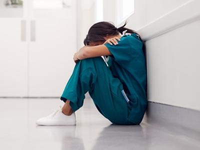 Overworked doc in hallway