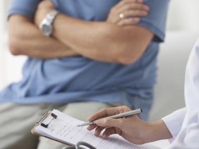 Patient and physician in doctor's office