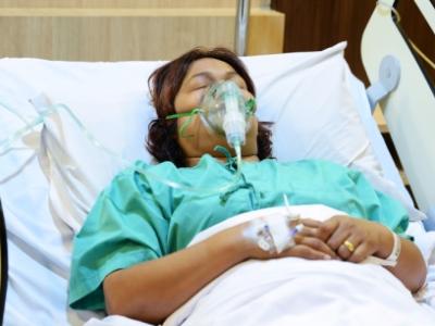 Patient with oxygen mask