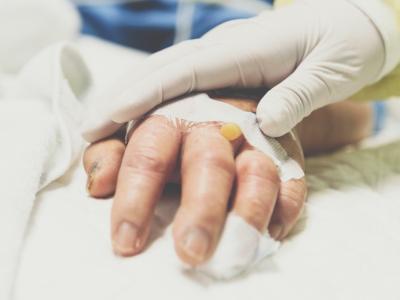 Patient hand with IV port