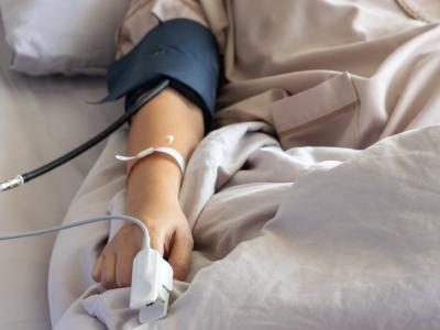 Patient with pulse oximeter