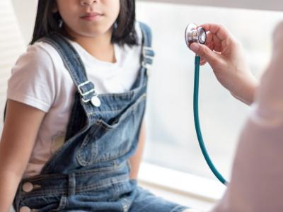 Girl and doc with stethoscope