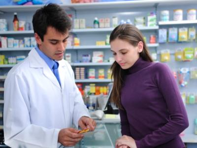 Pharmacist with customer
