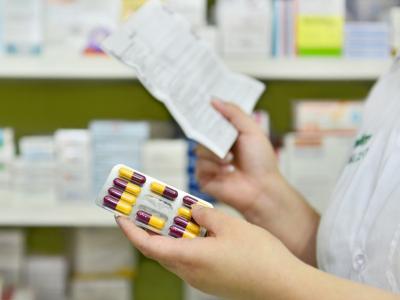 Pharmacist filling prescription