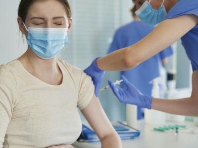 Pregnant woman getting vaccinated