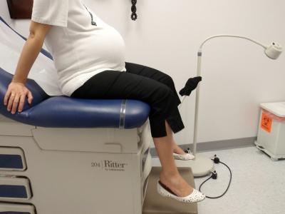 Pregnant woman in exam room