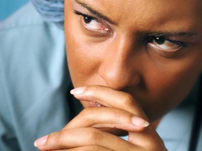 Sad, thoughtful nurse