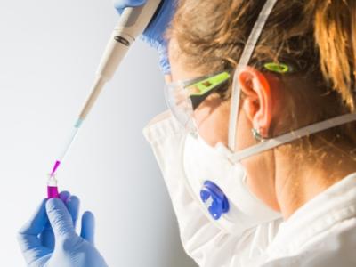 Scientist with pipette