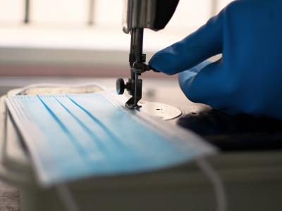 Surgical mask being made on sewing machine