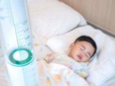 Sick Asian boy in hospital