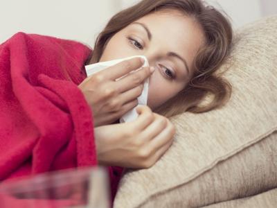 Sick woman on bed