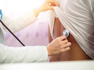 Stethoscope on patient's back