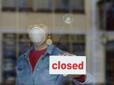 Store with closed sign