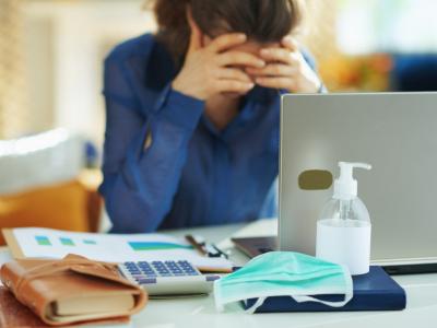 Stressed woman at computer