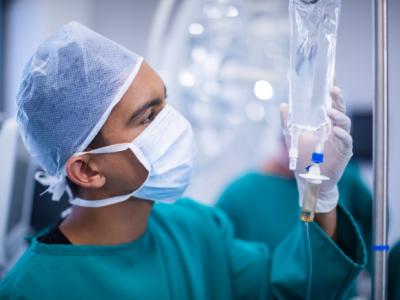 Surgeon with IV