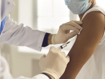 Syringe after injection into arm