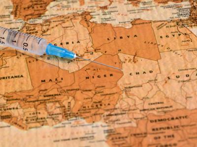 Syringe on map of West Africa