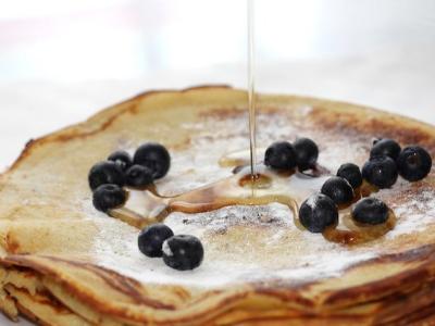 Syrup on blueberry pancakes