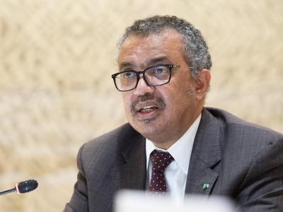 WHO Director-General Tedros at microphone