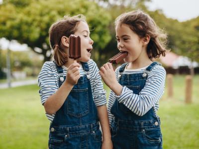 Twin girls with ice cream bars