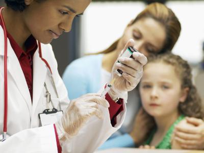 Child awaits vaccination
