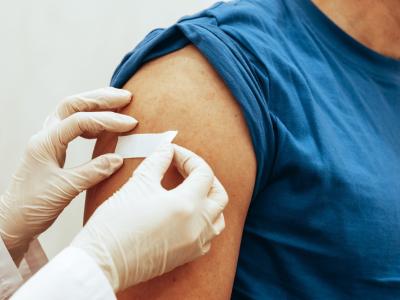 Vaccine bandage on arm