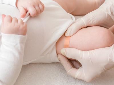 Vaccine band-aid on baby