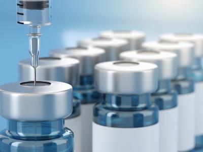 Vaccine vials and syringe