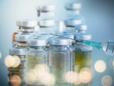 Vaccine vials and syringe