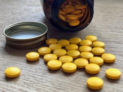 Vitamin D pills and bottle