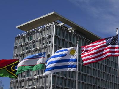 WHO headquarters building with flags