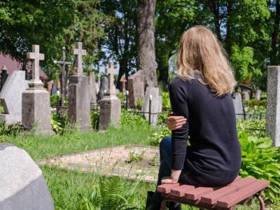 Grieving woman at graveside