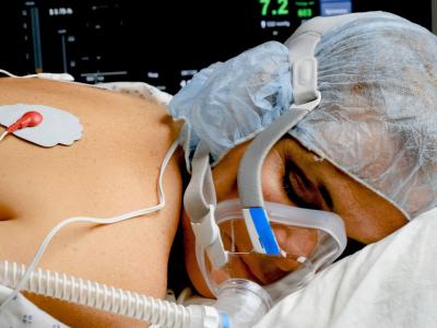 Woman on oxygen in prone position