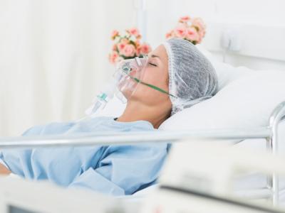 Woman receiving artificial ventilation