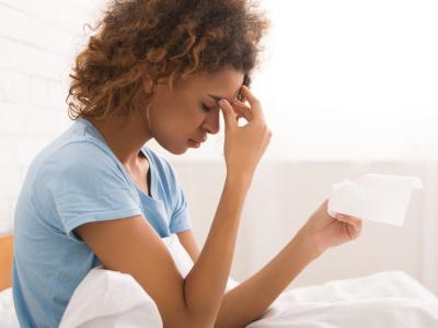Woman sick in bed