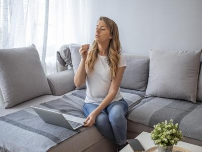 Woman swab-testing at home