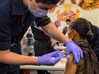 Woman getting COVID-19 shot