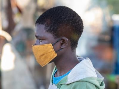 Young African man wearing mask