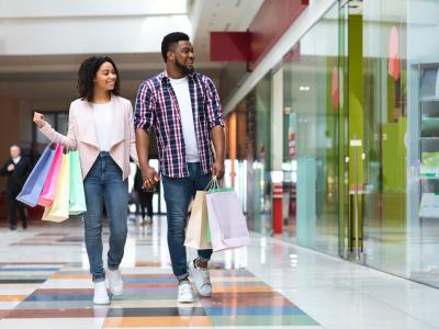 Young couple shopping in mall