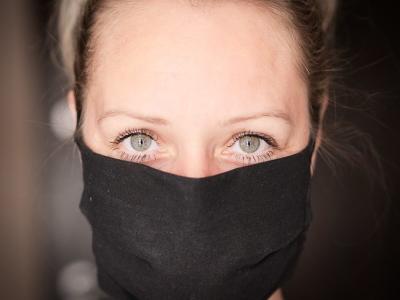 Woman wearing black mask