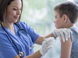 Boy getting vaccinated