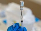 COVID vaccine vial and syringe