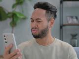 Man on phone not trusting