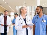 Doctors consulting with nurses