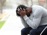 Fatigued man on park bench