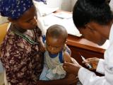 Boy receiving malaria vaccine