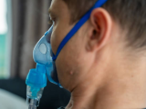 Man with nebulizer