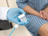 Woman and doctor after pap smear
