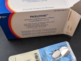 Paxlovid box and tablets